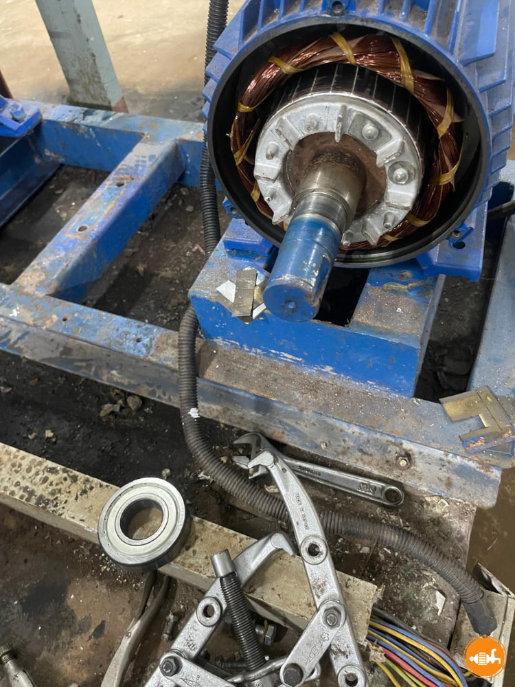 Disassembled Electric Motor with Bearing Puller
