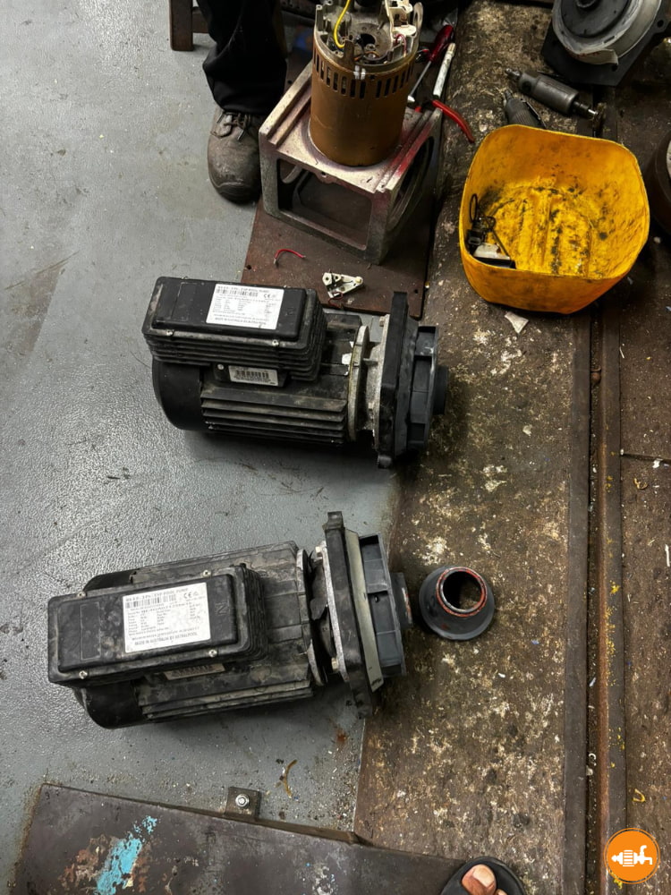 Disassembled Electric Motors in Workshop