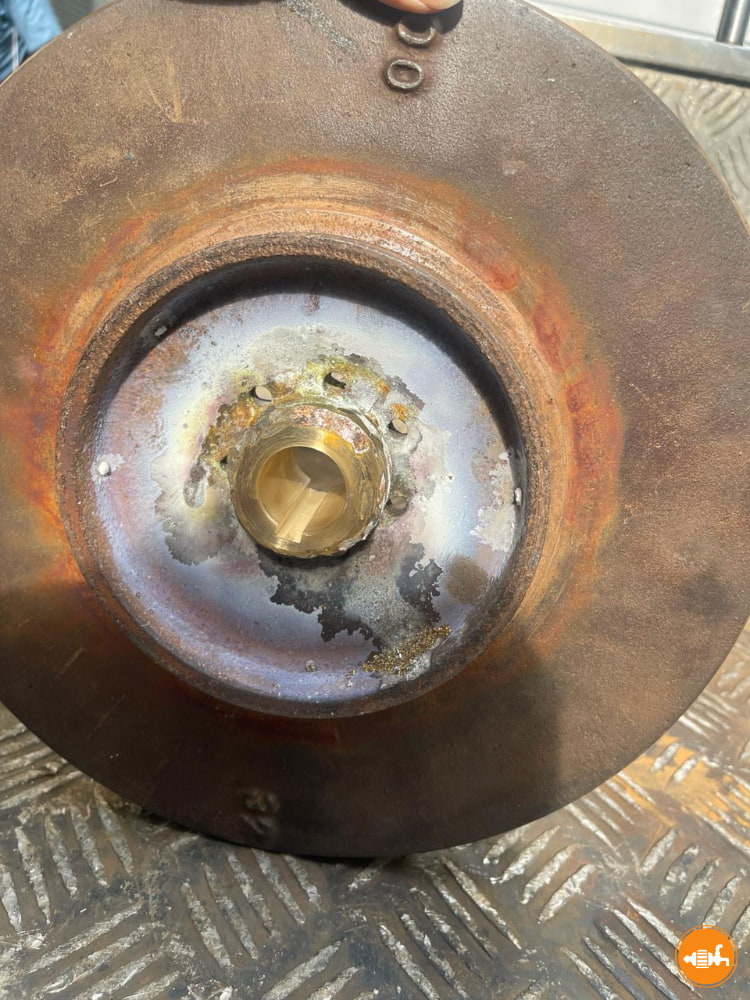 Rusty Industrial Pump Casing in Need of Repair